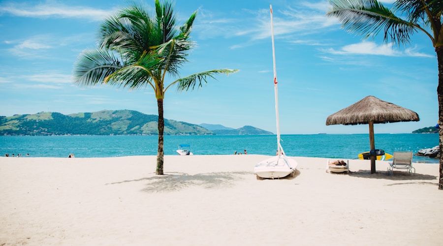 Small town waterfront with marina, boats, and boardwalk